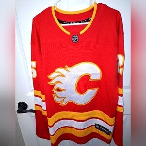 A Fanatics official NHL Calcgay Flames #25 Lex jersey in a men's size large. NWT